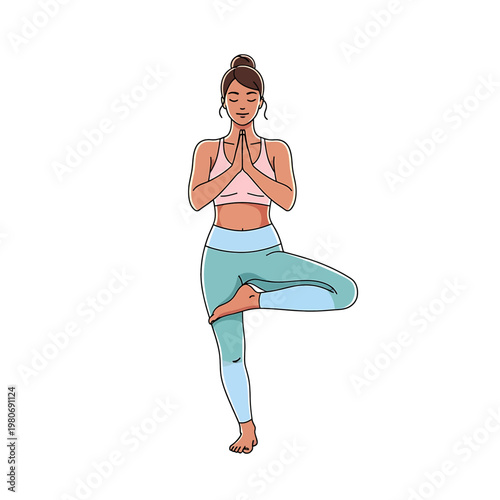 Woman in yoga tree pose standing 2.