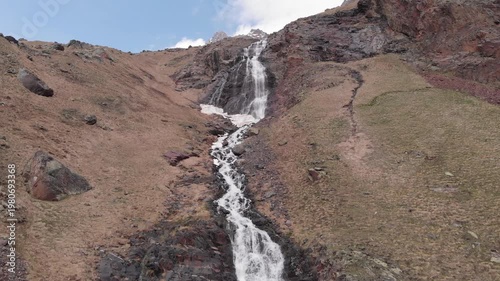 Caucasus, North Ossetia. Adaikom Gorge. Mountain stream on the slope.