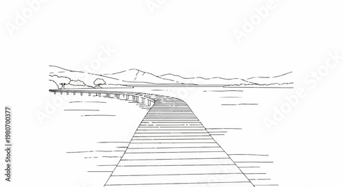 Wooden boardwalk curves across water toward distant hills under a clear sky