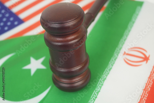 Flags of America, Pakistan and Iran with judge gavel. Negotiation of USA and Iran in Pakistan.