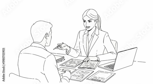 Two people in a professional setting discussing documents and a laptop