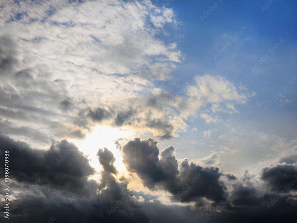 Fototapeta premium Sun behind clouds