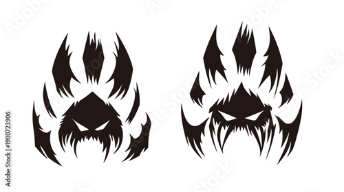 Two abstract symmetrical black designs resembling a stylized monster or demon face on white background