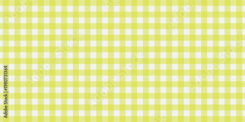Yellow and white gingham checkered pattern background, classic seamless table cloth texture, vector geometric plaid fabric design for kitchen, picnic, and fashion backdrop.