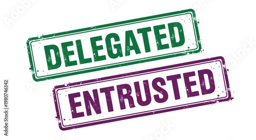 Two rubber stamps with the words delegated and entrusted in green and purple ink, symbolizing authority