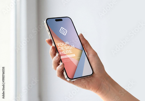 User Hand Holding Smartphone in White Interior Mockup