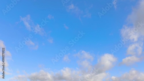 Landscape of clouds moving at midday