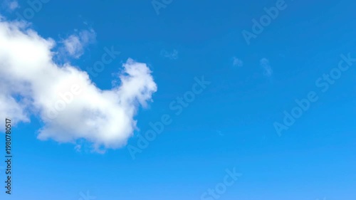 Radiant altocumulus cloud in the sky at noon