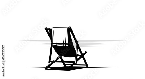 Black Beach Chair Sitting Alone.