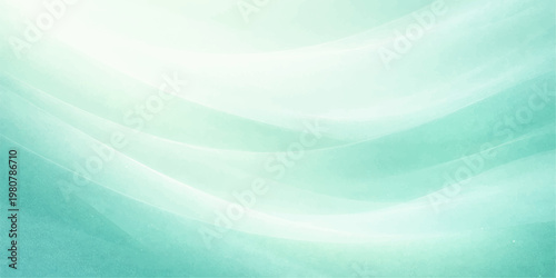 Abstract blue background with soft flowing waves and bright light effects creates a dynamic motion blur texture with green vector lines in this artistic wallpaper design