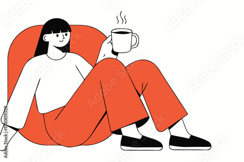 A young woman relaxes in a red chair while enjoying a warm drink