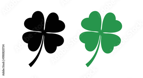 Two Four-Leaf Clover Icons One Black Silhouette and One Green Illustration Symbolizing Luck and Good Fortune