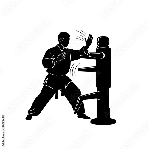 Man practices karate with punching dummy