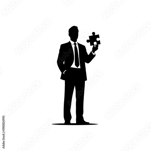 Silhouette of a Businessman Holding a Puzzle Piece in Hand.