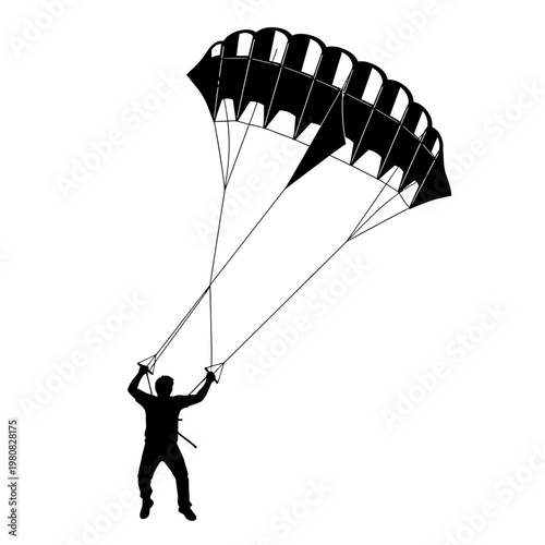 Man holds parachute strings while descending