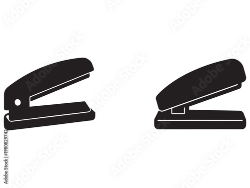 Two black staplers side by side on white background office supplies  stapling tools