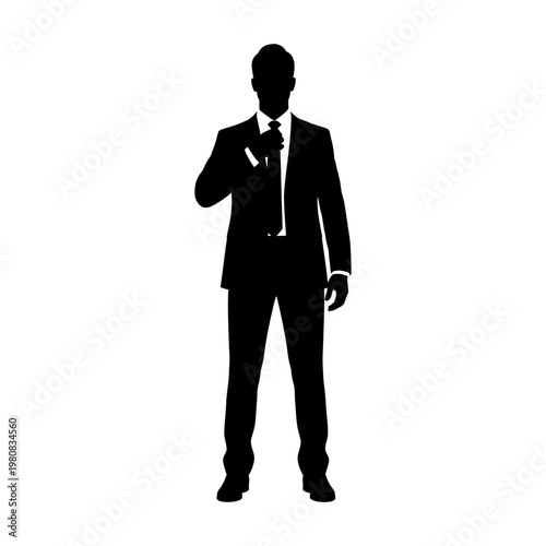 Silhouette of a Businessman in Suit Standing Confidently.