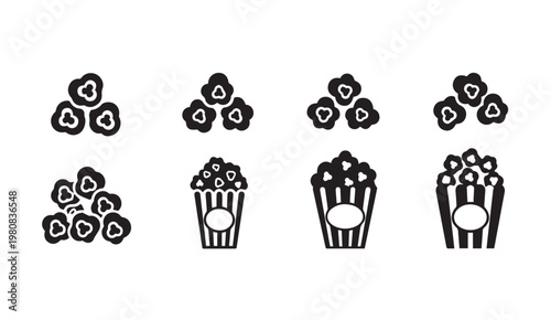 Popcorn icons in striped boxes and loose kernels for movie night and snacks
