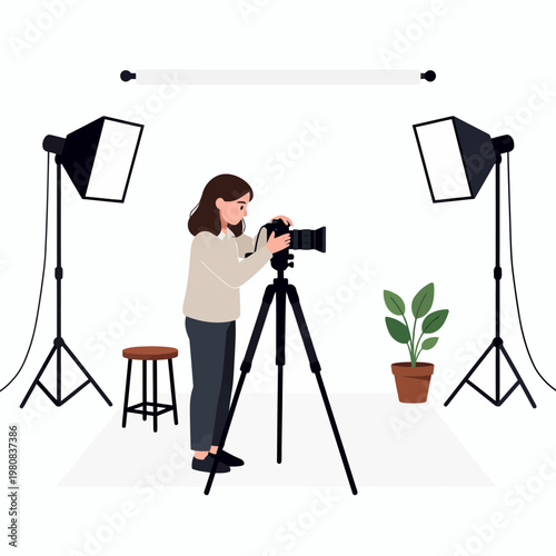 Woman working in a professional studio with camera equipment