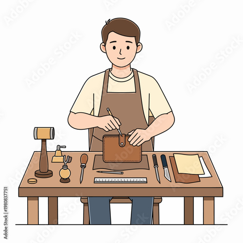 Man artisan working on a leather wallet at a workshop table
