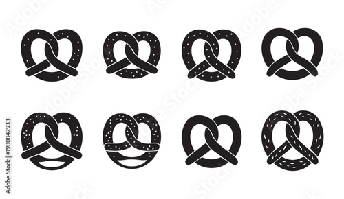 Crisp pretzel silhouettes isolated on white background with subtle texture details