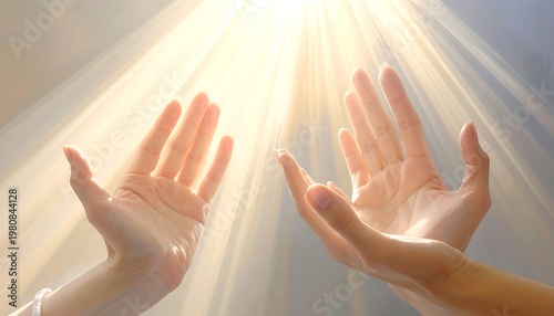 A pair of hands reaching up towards the sun's rays
