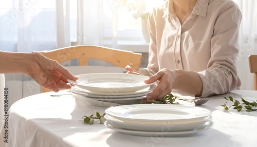 A person serves plates on a table