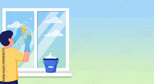 Person cleaning window with sponge and bucket.