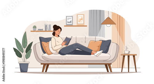 Woman reading a book on a comfortable sofa at home.
