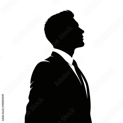 Silhouette of a Confident Businessman Looking Upward in Profile.