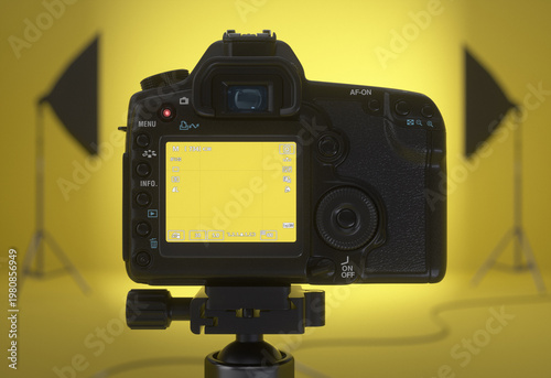 Close-up of a digital camera viewfinder. Empty display focusing on a yellow studio. Realistic 3D render.