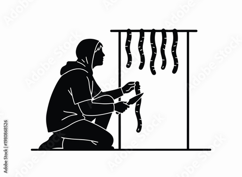 Hunter preparing food outdoors hanging meat on rack cooking over campfire for survival survivalism backcountry camping food preparation preparation food outdoors.