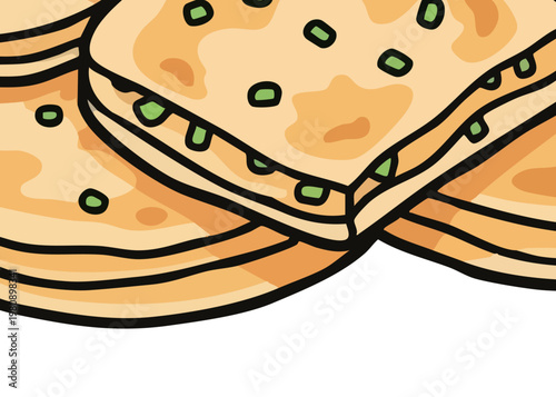 A stack of flatbread with green herbs.