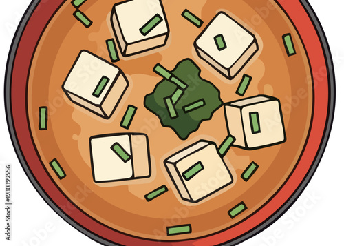 A bowl of tofu and seaweed soup.