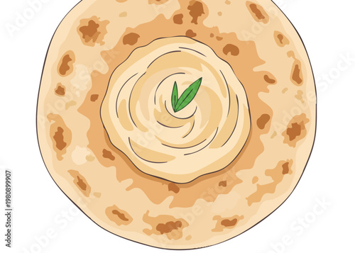 Flatbread with butter and leafy garnish.