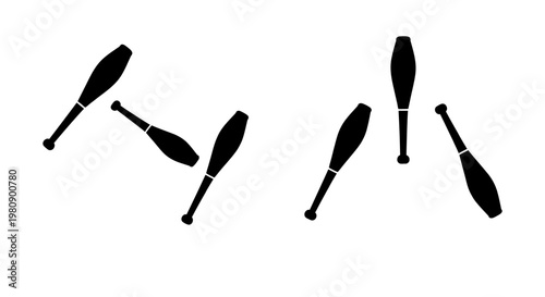 Black silhouettes of juggling clubs scattered across a white background