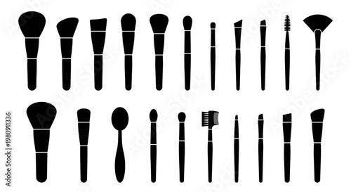 A collection of black silhouette makeup brushes arranged in two rows