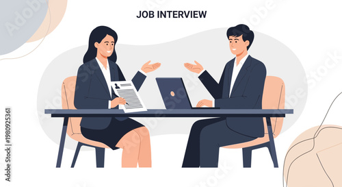 Job Interview: Woman interviewer and man candidate at desk with laptop