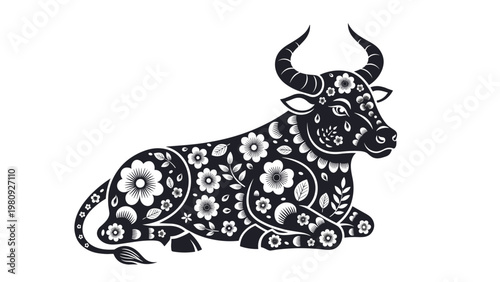 Artistic black silhouette of a sitting ox decorated with intricate white floral patterns and swirls isolated on a plain background.