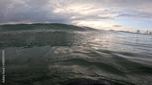 Surfing at Sunrise in the Ocean – Golden Morning Waves