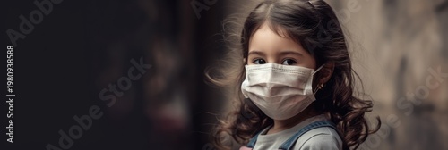 Little girl in medical mask
