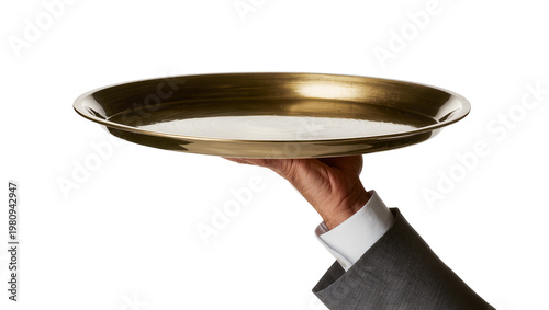 Fotografía Isolated Stylish hand of a formal server presenting an empty, gleaming brass serving dish