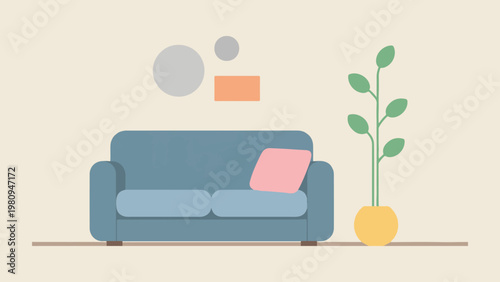 A blue couch with pink pillow and plant on pexels background