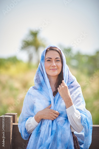 Portrait of a young beautiful brunette woman against the backdrop of the nature of northern Israel