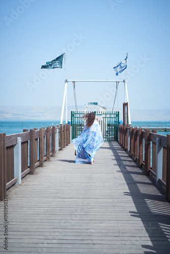 Portrait of a young beautiful brunette woman against the backdrop of the nature of northern Israel