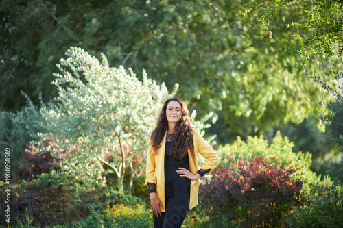 Portrait of a young beautiful brunette woman against the backdrop of the nature of northern Israel