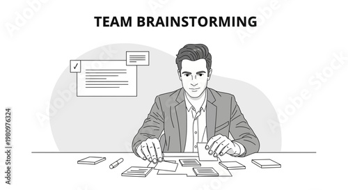Team Brainstorming: Man Organizing Ideas on Cards at Table