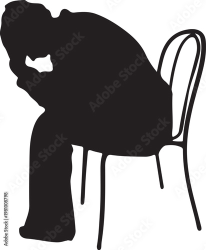 Silhouette of a depressed person sitting on a chair with head in hands