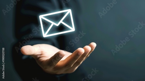 Male hand holding letter icon,email icons .Contact us by newsletter email and protect your personalinformation from spam mail, Customer service call center contact us.Email marketing and newsletter