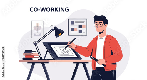 Young Man Working on Digital Tablet in Modern Co-working Space